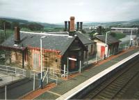 The fenced off former station building on the down side at Sanquhar in May 1998 [see image 28961]<br><br>[David Panton /05/1998]