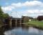 Super power for a short nuclear flask train as 66427 and 66423 cross a tranquil River Wyre at Scorton heading south on 8 May. This was an unexpected bonus while I was waiting for the <I>Duchess of Sutherland</I> steam special to pass this point heading for Carlisle.<br><br>[Mark Bartlett 08/05/2010]