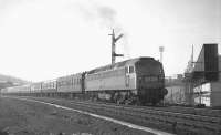 Brush type 4 no D1984 restarts train 2F28 eastbound following a signal check at St Margarets on 28 February 1970.  This was possibly the empty stock of the 12.55 from Glasgow Central via Shotts (due in Waverley at 14.28) with the usual DMU replaced by a locomotive and coaches that particular Saturday because of the Hibs v Rangers match at Easter Road [see image 27804]. <br>
<br><br>[Bill Jamieson 28/02/1970]