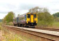 A slightly grubby looking Carlisle - Newcastle service formed by 156479, approaching Haltwhistle from the west on 16 May 2010. <br><br>[John Steven 16/05/2010]