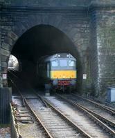 7639 waits at the north portal of Grosmont tunnel in March 2010. Part of the NYMR's Grosmont locomotive depot is visible at the south end of the tunnel.<br><br>[John Furnevel 26/03/2010]