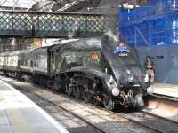 60019 <I>Bittern</I> simmering gently in the morning sunshine at Waverley platform 1 on the morning of 17 May 2010. The A4 was at the head of <I>'The Coronation'</I>, an Edinburgh - London return special which it was scheduled to take south as far as York.<br><br>[David Panton 17/05/2010]