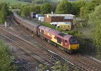 Empty stock off the evening Edinburgh - Cardenden commuter train returns south on 20 May behind 67008, seen here passing Inverkeithing Central Junction.<br><br>[Bill Roberton 20/05/2010]