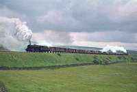 A northbound freight fights its way up Shap in the mid sixties between Scout Green and Shap Wells with the help of a Fairburn 2-6-4T at the rear.<br><br>[Robin Barbour Collection (Courtesy Bruce McCartney) //]