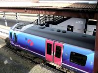 View from the south end of the footbridge at York on 21 March as a TransPennine Express service for Middlesbrough (ex-Manchester Airport) is about to leave platform 11.<br><br>[John Furnevel 21/03/2010]