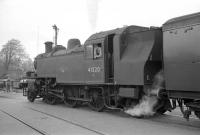 41320 waiting to leave Lymington Pier for Brockenhurst on 9 April 1967 on a leg of the LCGB <I>Hampshire Branch Lines Railtour</I>. 80151 was at the other end of the train on this occasion, having hauled the outward trip.<br><br>[Robin Barbour Collection (Courtesy Bruce McCartney) 09/04/1967]