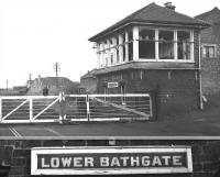 The level crossing and signal box at Lower Bathgate, complete with close-up of nameboard, photographed in February 1970, a short time after closure. <br><br>[Bill Jamieson /02/1970]