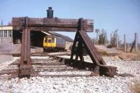 A single-unit railcar from Maiden Newton rests at the Bridport terminus of the former West Bay branch in Dorset in the summer of 1971. The branch, which had been cut back to Bridport in 1962 closed completely in 1975, a very late casualty of the Beeching Report. [See image 13066]<br>
<br><br>[David Spaven //1971]