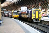 South facing bay platforms 6&7 at York on 25 March 2010 with a 142 on a service to Sheffield standing alongside a 158 about to depart for Blackpool North.<br>
<br><br>[John Furnevel 25/03/2010]