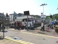 A busy scene at Oban railway station during a particularly warm and pleasant Sunday 23 May 2010. Standing at the platform is unit 156 474, forming the 12.11 service to Glasgow Queen Street.<br><br>[Ken Browne 23/05/2010]