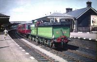 Ex-Great North of Scotland Railway 4-4-0 No 49 <I>Gordon Highlander</I>, with 5 coaches plus observation car, stands on the centre road at Dumfries on 13 June 1959. The train is the SLS <I>Golden Jubilee Special</I> originating from Glasgow Buchanan Street, which had arrived tender-first via the Dumfries Lochmaben and Lockerbie line.<br><br>[A Snapper (Courtesy Bruce McCartney) 13/06/1959]