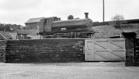 Unique ex-GWR pannier tank no 3711 photographed at the Forth Banks works of Robert Stephenson & Hawthorn, Newcastle, in 1958. This unusual locomotive featured in the July 2000 edition of 'British Railways Illustrated' with the following caption... <I>In 1958 Swindon showed new interest in oil burning (following a visit from a particularly effective RS&H salesman, it is sometimes said) and so in April despatched no 3711 to Robert Stephenson & Hawthorn at Forth Banks Works, Newcastle, where it was recorded on 2nd May that year, after conversion. The fuel tank can be seen extending above the bunker while the capped chimney suggests the engine spent some time idle on its sojourn in the north of England. On return to the WR, 3711 was stationed at Old Oak and later at Swindon, but there were no more conversions and it was withdrawn in May 1963 still an oil burner</I>.<br><br>[K A Gray /05/1958]