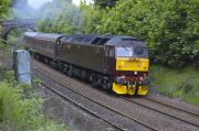 47760 leads the SRPS North Berwick - Kyle of Lochalsh charter uphill from Dalgety Bay on 29 May 2010. 47826 was bringing up the rear of the train.<br><br>[Bill Roberton 29/05/2010]