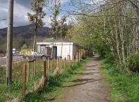 The station yard at Killin has been properly surfaced and marked out as a car and bus park since my last visit in 2008 [See image 19277]. There has also been some landscaping and these saplings, alongside the trackbed, already obscure the distinctive mountain backdrop that was a feature of photos of the station in operation.<br><br>[Mark Bartlett 18/05/2010]