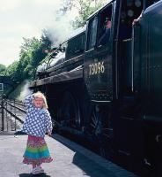 <I>Oh, goody! I was expecting a diesel!</I> A young enthusiast shows her delight as BR Standard Class 5 no 73096 prepares to head out of Alresford station on the Watercress Line, in the summer of 2008.<br>
<br><br>[David Spaven //2008]