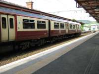 View east at Dumbarton Central Station on 28 May 2010, with an EMU destined for Airdrie at the platform.<br><br>[Alistair MacKenzie 28/05/2010]