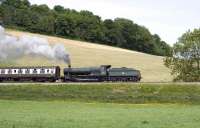 3850 eastbound shortly after leaving Williton on the West Somerset Railway on 30 May 2010 with a train for Bishops Lydeard.<br><br>[Peter Todd 30/05/2010]