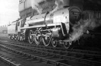 Britannia Pacific no 70013 <I>Oliver Cromwell</I> stands on Blackpool North shed (Talbot Road) on Boxing Day 1967 after bringing in a football excursion from Carlisle. Although officially closed in 1964, Blackpool North was used to service locomotives until almost the end of steam. The shed was finally demolished in 1975. (Note for football fans: The league division 2 match at Bloomfield Road on 26 December 1967 ended Blackpool 1 Carlisle United 1 and was watched by a crowd of 20,732.)<br><br>[Robin Barbour Collection (Courtesy Bruce McCartney) 26/12/1967]