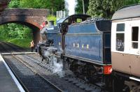 Sunshine and steam at Bishops Lydeard on 30 May 2010, as departure time approaches for ex-Somerset & Dorset 2-8-0 no 88.<br><br>[Peter Todd 30/05/2010]