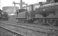 Shed scene at Kipps (65E) in July 1961, two years before official closure to steam (although the shed continued as a diesel stabling point for several years). Line up left to right is V3 2-6-2T no 67674, J88 0-6-0 no 68345 and J35 0-6-0 no 64472. Demolition and clearance of the remains of Kipps shed took place in 1975.<br><br>[K A Gray 03/07/1961]