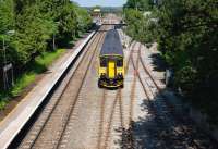 150243 southbound leaving Kemble en route to Swindon on 3 June 2010. The sidings on the right are all that remains of the former GWR branch to Cirencester, now used for PW activities.<br><br>[Peter Todd 03/06/2010]