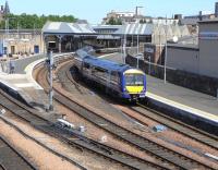 Looking north east along the Dundee platforms at Perth station from St Leonards Bridge on 31 May 2010. 170 420 is restarting from platform 1 with an Aberdeen - Glasgow Queen Street service.<br><br>[David Panton 31/05/2010]