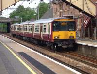 Partick bound 318 270, awaiting departure from Uddingston on 2 June 2010.<br><br>[John Steven 02/06/2010]