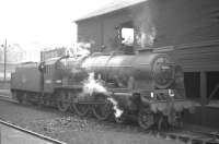 Royal Scot no 46107 <I>Argyll and Sutherland Highlander</I> drifts away from the coaling stage at Dalry Road shed on 24 March 1962. Note the ex-Caledonian semaphore route indicator above the buffer beam. The edge of Dalry Road station's island platform can be seen at the bottom of the picture.<br><br>[Frank Spaven Collection (Courtesy David Spaven) 24/03/1962]