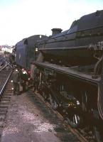 A northbound steam-hauled railtour stands at Ayr platform 3, thought to be in the mid 1960s, double-headed by unidentified Stanier and BR Standard class 5 locomotives.<br><br>[Robin Barbour Collection (Courtesy Bruce McCartney) //]