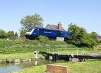 A westbound First Great Western HST passing Crofton pumping station on the Berks & Hants line on 4 June 2010.<br><br>[Peter Todd 04/06/2010]