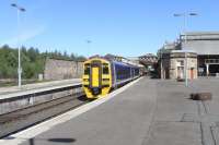 After a briefer than usual tunaround time, caused by a late arrival, <br>
the unbranded 158 789 pulls out of bay Platform 5 at Perth on its return through Fife to Edinburgh on 31 May 2010. The 15 mile section between Hilton Junction and Ladybank is single-track throughout. It probably sees more passenger trains than it ever has, but has had no intermediate stations since 1955 when the line closed to passengers until 1975. Could at least Newburgh and Bridge of Earn have enough potential traffic to warrant reopening? <br>
<br><br>[David Panton 31/05/2010]