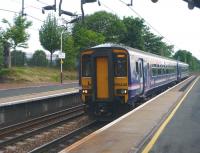 Glasgow Central - Edinburgh Waverley service, formed by 156446, passing through Uddingston on 2 June 2010. <br><br>[John Steven 02/06/2010]