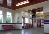 The immaculate interior of the waiting room at Girvan, Scotland's only art deco station, seen on 3 June. Even the ceiling is glossy. The more modern seating is unfortunately not sympathetic, though probably more comfortable than the wooden benches it no doubt replaced.<br><br>[David Panton 03/06/2010]