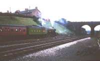 4472 <I>Flying Scotsman</I> stands at Etterby Road bridge, Carlisle, with a special in the sixties.<br><br>[Robin Barbour Collection (Courtesy Bruce McCartney) //]