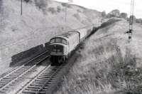 A <I>Peak</I> with the up Thames-Clyde Express, photographed on the approach to Neilston Low in March 1966.<br><br>[Colin Miller /03/1966]