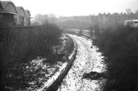 View west from Craighall Road overbridge towards Newhaven Junction in January 1970. The Caledonian's Leith New Lines, running from here to Leith East and the docks, opened in August 1903 with passenger stations planned at Newhaven (South?) as shown here, Ferry Road and Leith Walk (Manderston Street). Despite work being well advanced on all 3 stations none was ever opened and the line was singled in 1917 after only 14 years. This particular section was closed completely in 1966. [With thanks to Alan Buchan, Patrick Hutton, Gordon Ferris and Keith Bathgate.]<br>
<br><br>[Bill Jamieson /01/1970]