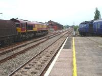 66137 shut down in the up centre road at Hereford Station on 10 June 2010 awaiting the arrival of a new driver, whilst power car 43144 idles at the north end of platform 1 before leading the 15.11 First Great Western HST service to London via Worcester, the Cotswold line, and Oxford.<br><br>[David Pesterfield 10/06/2010]