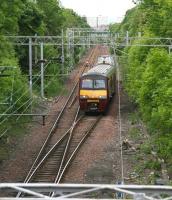 Craig Street bridge, Airdrie, looking west on 14 June 2010, with the 1123 service from Balloch approaching the station.<br><br>[John Furnevel 14/06/2010]