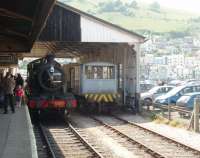 GWR 5239 must be a real asset for the Paignton and Dartmouth Steam Railway. Here the 42XX 2-8-0T is running round at Kingswear after hauling seven coaches over the steeply graded line but two days later I saw it lifting eleven coaches up the bank unassisted. The overall roof survives at the Kingswear terminus by the side of the River Dart and Dartmouth itself can be seen on the opposite bank of the estuary, a short ferry ride away. <br><br>[Mark Bartlett 14/06/2010]