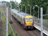 Hillington East on 19 June 2010 as eastbound 334 037 arrives with a Gourock to Glasgow service.<br><br>[David Panton 19/06/2010]