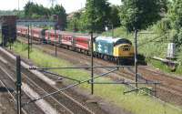 40145 with the Compass Tours <I>Fathers day Scotsman</I> to Edinburgh on 20 June 2010, seen here heading north on the WCML near to the site of the former Farington station. The overbridge behind the loco carries the East Lancs line from Farington Curve Junction (behind the photographer to the right) to Lostock Hall Junction (to the left of the photo).<br>
<br><br>[John McIntyre 20/06/2010]