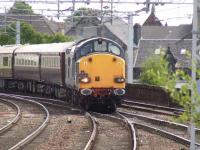 37607 about to pass through Paisley Gilmour Street on 19 June at the head of the <I>Northern Belle</I> tour from Chester to Wemyss Bay. The <I>Northern Belle</I> is normally hauled by a Class 67 locomotive, however, since these are banned from the Wemyss Bay branch DBS hired two DRS Class 37s to handle the train. <br><br>[Graham Morgan 19/06/2010]