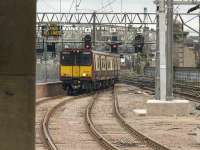 314209 about to draw into the new Platform 12 at Glasgow Central, as seen through the arch at the end of the platform.<br><br>[Graham Morgan 20/05/2010]