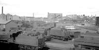 View north east over the shed yard at Ayr in the July 1966 from Viewfield Road footbridge. Locomotives in the busy yard include 'Crab' no 42789 bottom left, with Blackhouse Junction signal box visible in the right background.<br><br>[K A Gray 31/07/1966]