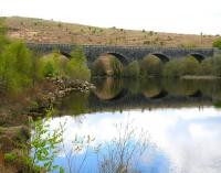 The Stroan Viaduct carried the Dumfries - Stranraer line across the southern narrows of Loch Stroan between New Galloway and Gatehouse of Fleet stations. Photographed looking south over the Loch on 12 May 2010. The old trackbed is now a walkway.<br><br>[John Furnevel 12/05/2010]