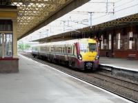 334 039 stands at platform 1 at Paisley Gilmour Street on 14 June with a late-running Wemyss Bay to Glasgow Central service.<br><br>[David Panton 14/06/2010]