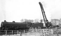 Derailment at Duns. B1 no 61116 off the road at the east end of the run-round loop at Duns while shunting the daily freight from Tweedmouth. The date went unrecorded but is probably early spring 1963, possibly when the locomotive was being transferred from Neasden to Eastfield and was requisitioned by 52D for this duty.<br><br>[Bill Jamieson //1963]