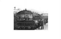 Another 1905 view of the then new railmotor service at Holcombe Brook terminus. Here the crew poses in front of what we would now think of as the <I>driving trailer end</I> of the unit before returning to Bury Bolton Street. [See image 21492], taken from the same position forty seven years later, that also shows the station building, the house with the hexagonal tower and Holcombe Hill behind. Photo courtesy of Bury Historical Society.<br><br>[W A Camwell Collection (Courtesy Mark Bartlett) //1905]