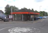 Strathclyde Red (orange, really) with its stylised map logo was <br>
superseded in 1997 by the carmine and cream livery and colour scheme for stations. In 2008 a unified 'Scotland's Railway' image was introduced which would subsume the SPT one. While the new livery has not made much headway, repainting of stations to blue and white proceeds apace.Meanwhile there are still pockets of Strathclyde Red signs, mainly on bridges over roads at station. Blantyre station building though is, I believe, the only one still to have the image before last and is looking defiantly 1980s on 16 June 2010. <br>
<br><br>[David Panton 16/06/2010]