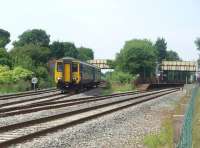 View west at Lostock Junction sees 156466 dropping down from Westhoughton to join the line from Preston and Chorley and run to Bolton. When the station reopened in 1988 (as plain Lostock) the platforms were only reinstated on the Preston line. <br><br>[Mark Bartlett 26/06/2010]